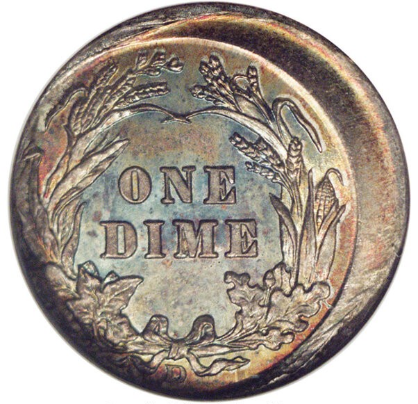 1915 Barber dime off-center strike error showing design shifted off-axis with blank planchet crescent visible